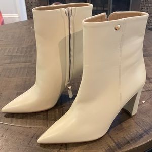 These is a pair of Tory Burch Penelope Booties